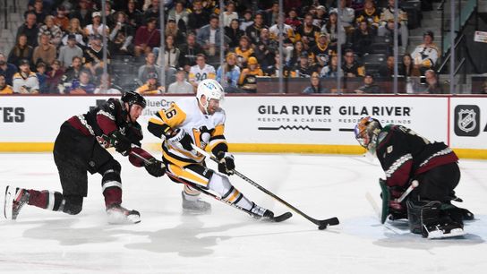 Freeze Frame: Zucker goes upstairs where mom hides cookies for sick goal taken in Tempe, Ariz. (Penguins)